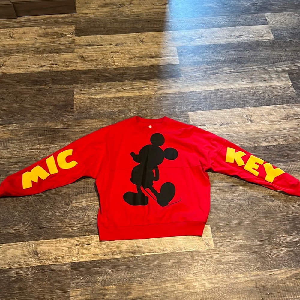 Disney Red Sweatshirt with Black Mickey Silhouette and Yellow Sleeve Text